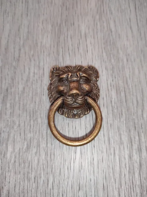 Pomolo leone ad anello brunite antico